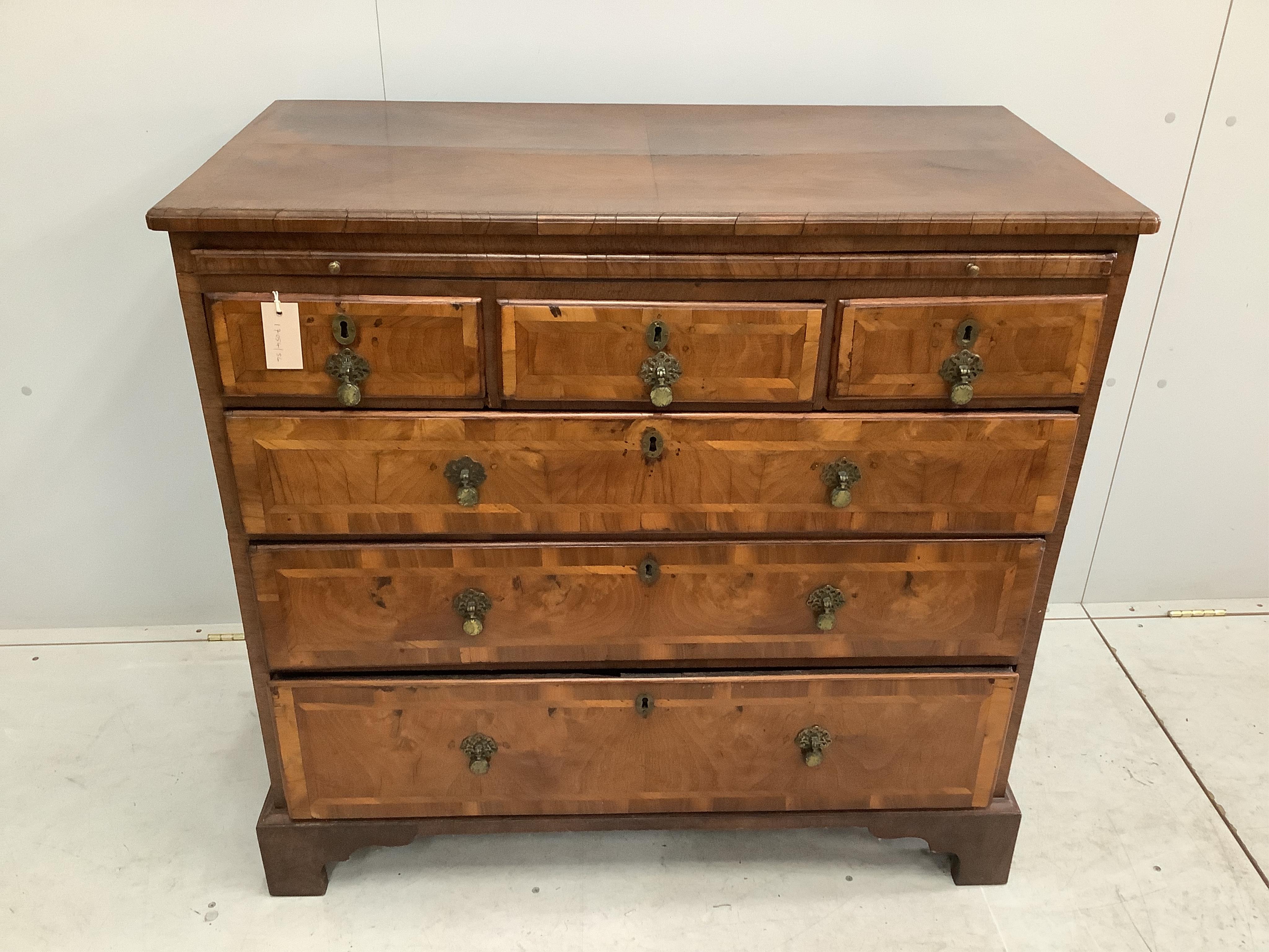 A George II walnut and isometric banded chest of drawers, width 99cm, depth 51cm, height 94cm. Condition - fair